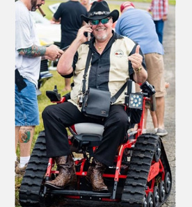 Owner Bradley S. Krause on his all-terrain tank tread chair